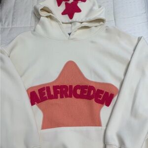 Cream Hoodie with Red Star Design